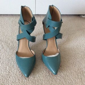 Stylish green Joe’s Jean strapped heels